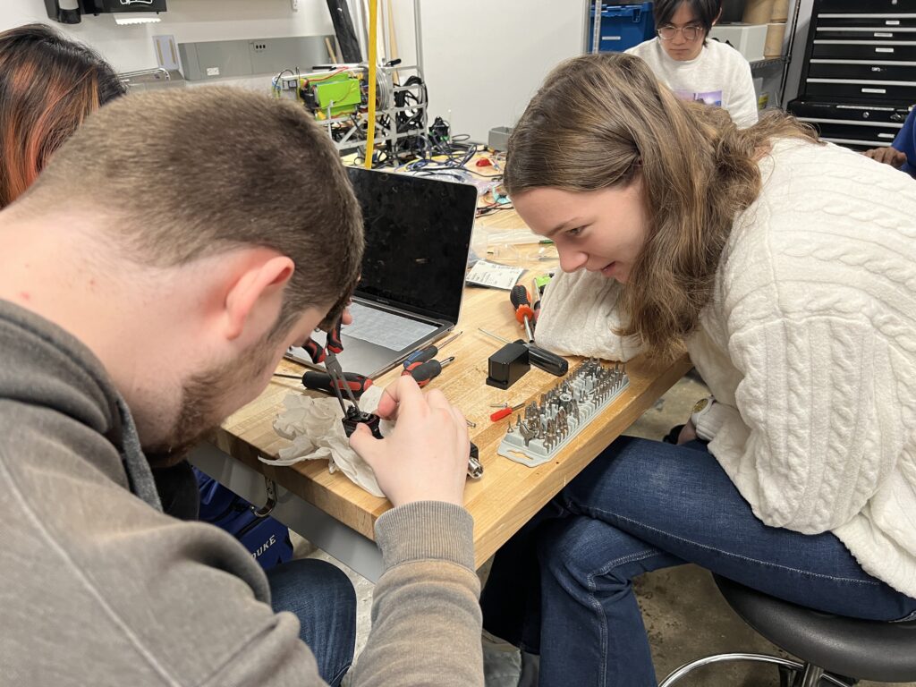 Club members working on the robot